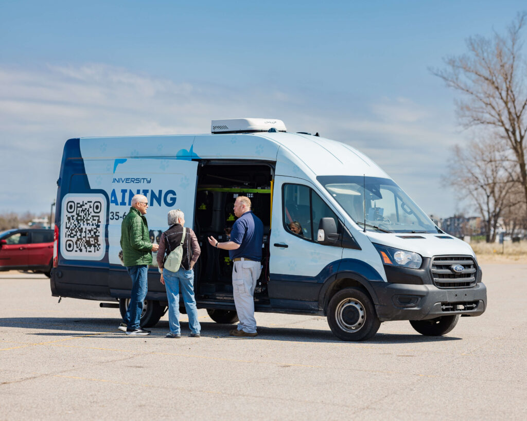 Dogology University mobile dog training van during a client consultation in West Michigan