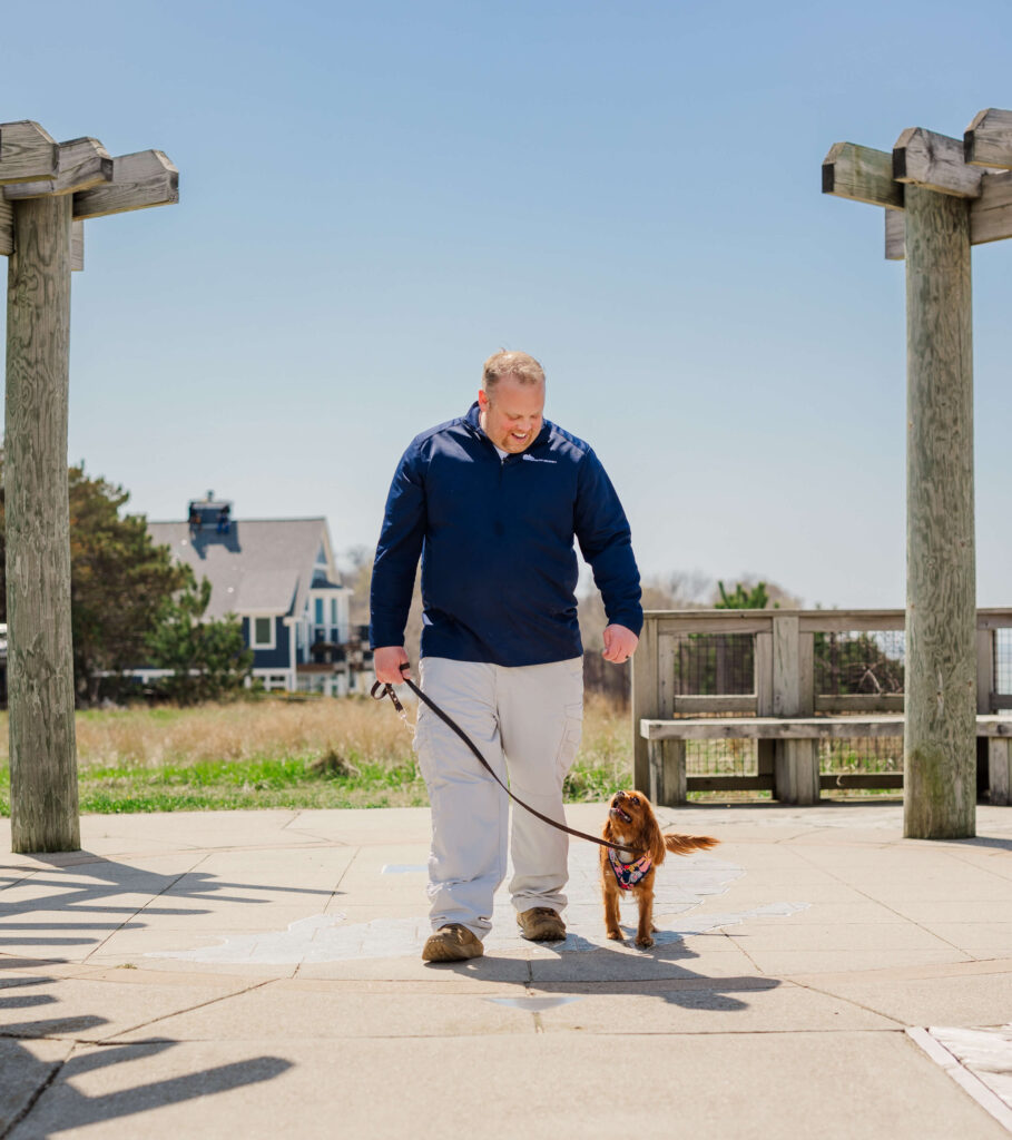 Dog training session at Tunnel Park in Holland MI practicing loose leash walking